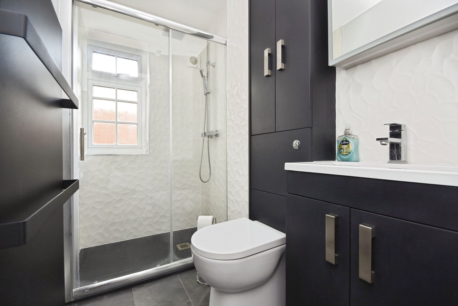 Walk-in shower room with modern vanity